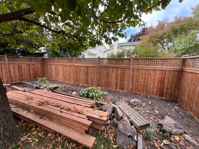 Fence, deck and raised garden